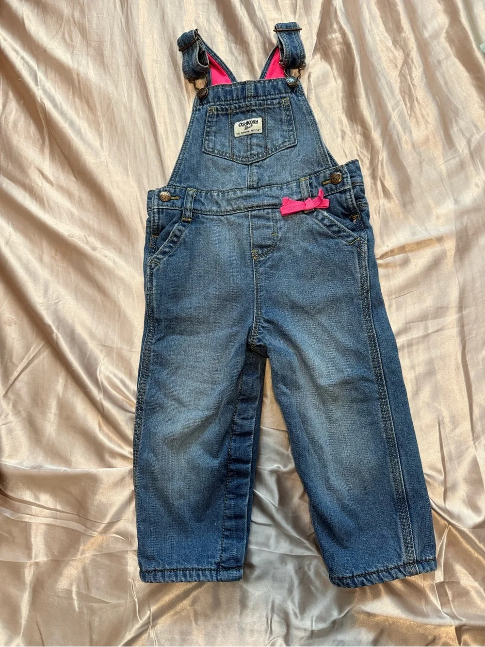 OshKosh B'gosh Fleece lined denim overalls.